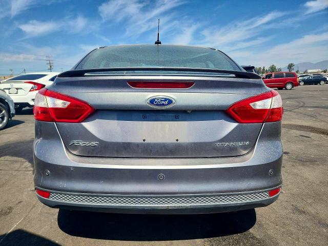 Zdjęcie 6 z aukcji – 2014 FORD FOCUS z VIN 1FADP3J28EL321651