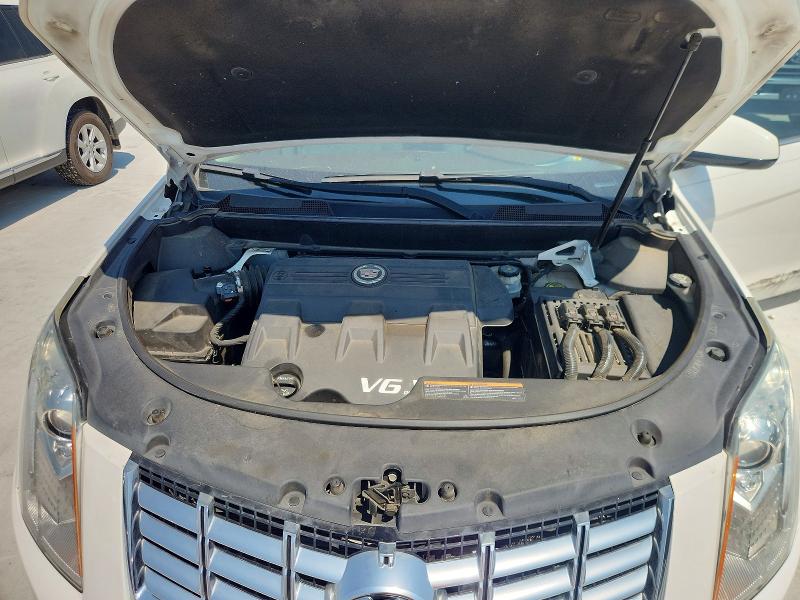 Photo 12 from auction – 2015 CADILLAC SRX with VIN 3GYFNDE3XFS598924