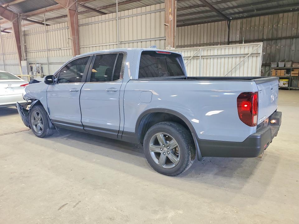 Photo 2 from auction – 2023 HONDA RIDGELINE with VIN 5FPYK3F52PB038561