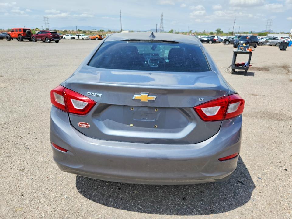 Photo 6 from auction – 2018 CHEVROLET CRUZE with VIN 1G1BE5SM9J7216163