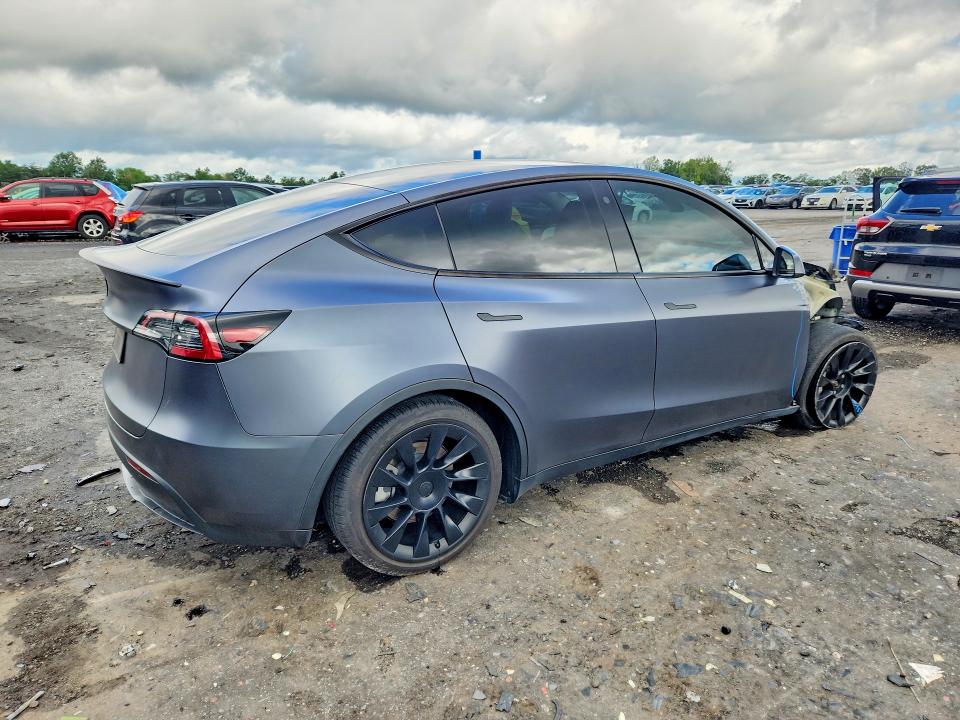 Photo 3 from auction – 2023 TESLA MODEL Y with VIN 7SAYGAEE2PF694780
