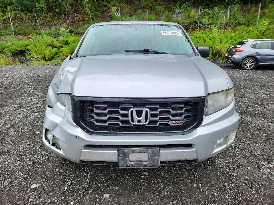 Photo 5 from auction – 2014 HONDA RIDGELINE with VIN 5FPYK1F75EB004097