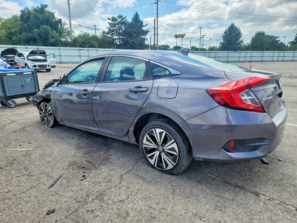 Photo 2 from auction – 2018 HONDA CIVIC with VIN 19XFC1E30JE003435