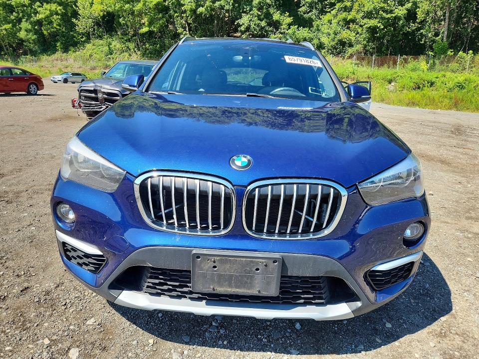 Photo 5 from auction – 2016 BMW X1 with VIN WBXHT3C30G5E48484