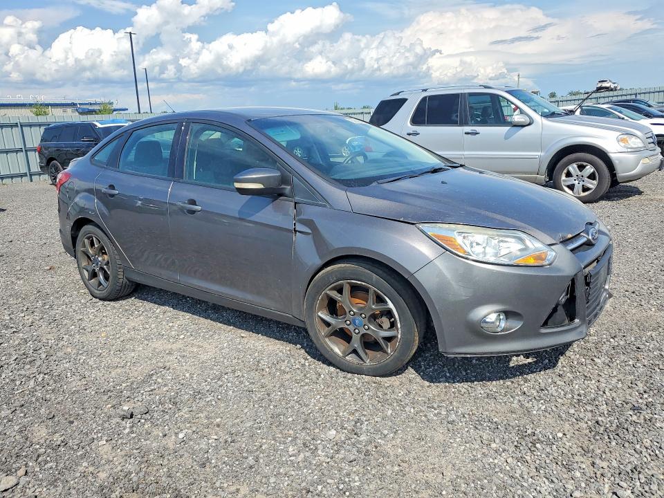 Photo 4 from auction – 2013 FORD FOCUS with VIN 1FADP3F24DL268759