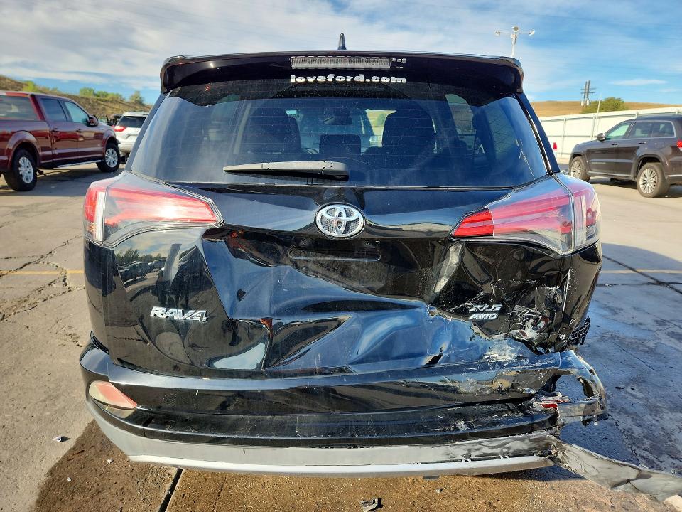 Photo 6 from auction – 2018 TOYOTA RAV4 with VIN 2T3RFREV8JW792278