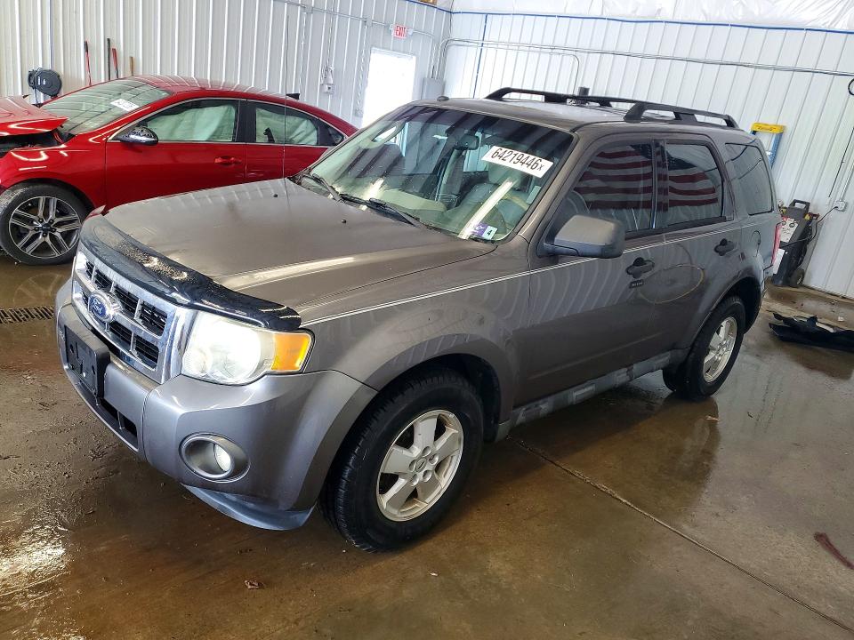FORD ESCAPE 2011 with VIN 1FMCU0DG1BKB30087 - Photo from auction