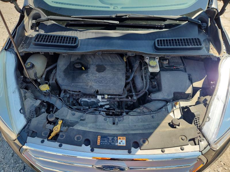 Photo 12 from auction – 2018 FORD ESCAPE with VIN 1FMCU9GD2JUA90997