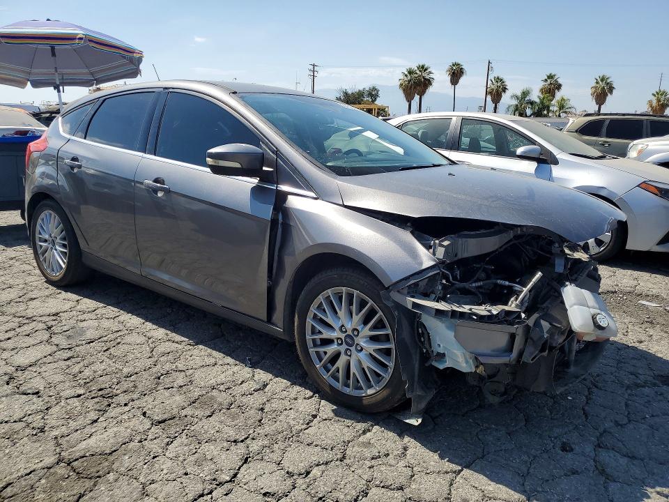 Photo 4 from auction – 2014 FORD FOCUS with VIN 1FADP3N23EL294269