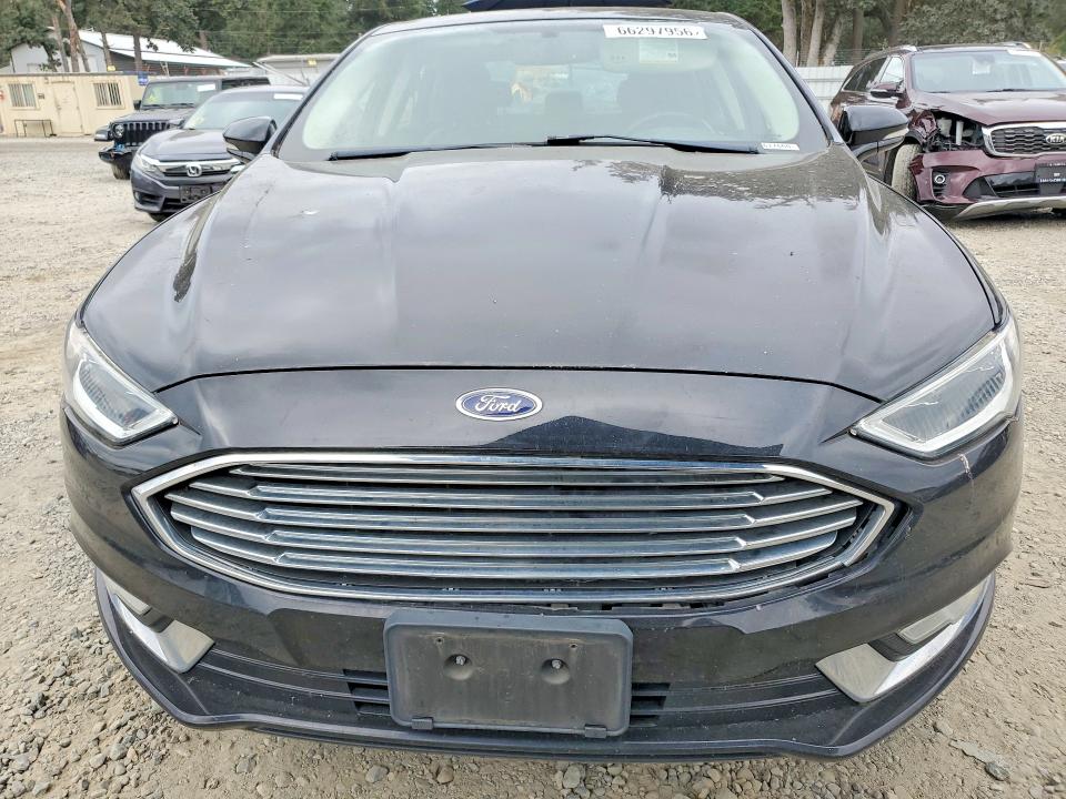 Photo 5 from auction – 2017 FORD FUSION with VIN 3FA6P0T93HR303789