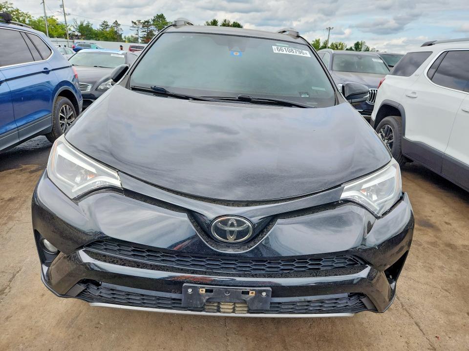 Photo 5 from auction – 2018 TOYOTA RAV4 with VIN 2T3JFREV1JW768871