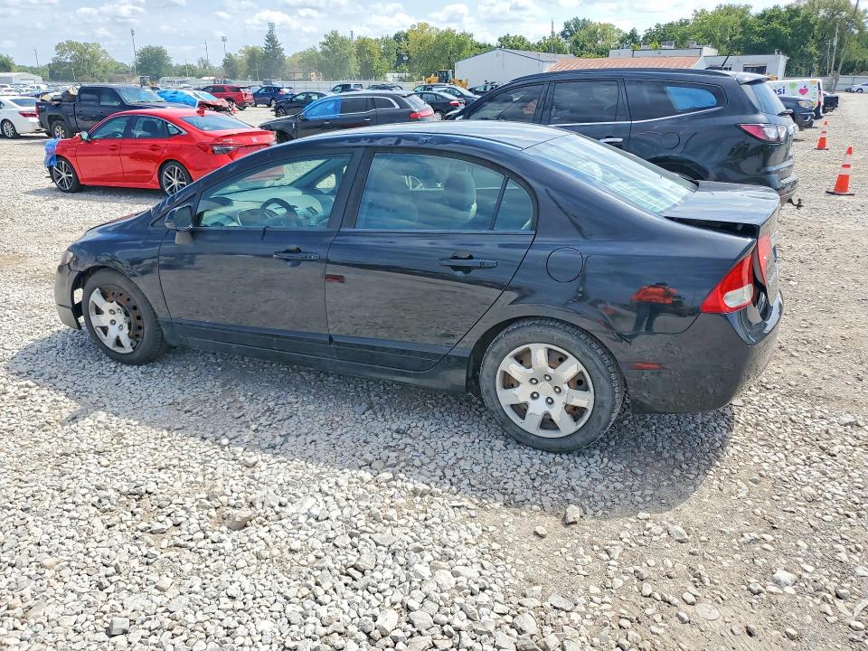 Photo 2 from auction – 2011 HONDA CIVIC with VIN 19XFA1F59BE003117
