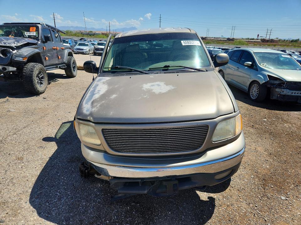Photo 5 from auction – 2001 FORD F150 with VIN 1FTRW08L91KF37900