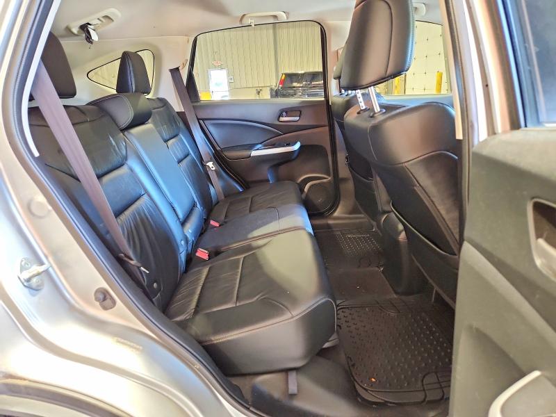 Photo 11 from auction – 2012 HONDA CR-V with VIN JHLRM4H72CC019594