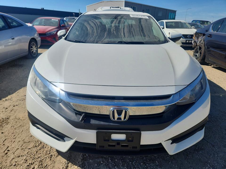 Photo 5 from auction – 2016 HONDA CIVIC with VIN 2HGFC2F74GH018574