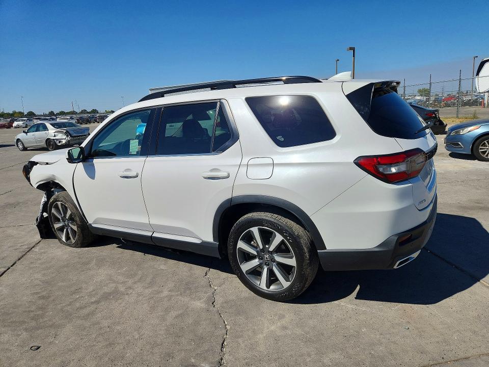 Photo 2 from auction – 2023 HONDA PILOT with VIN 5FNYG1H78PB054244