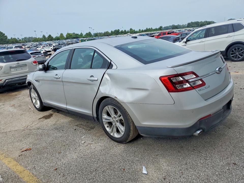 Photo 2 from auction – 2014 FORD TAURUS with VIN 1FAHP2E85EG157701