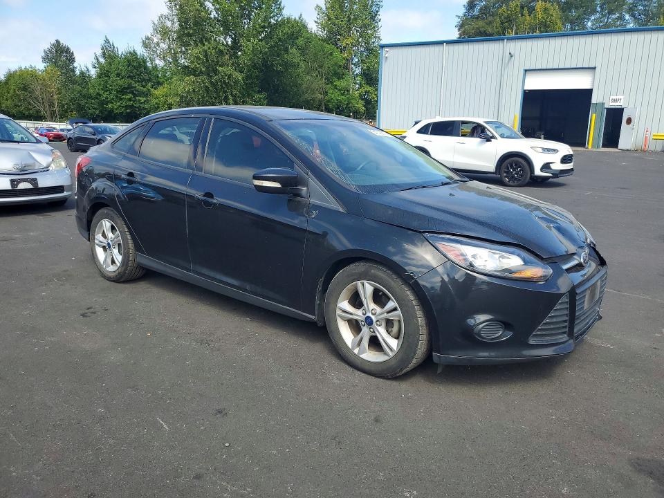 Photo 4 from auction – 2014 FORD FOCUS with VIN 1FADP3F27EL283600