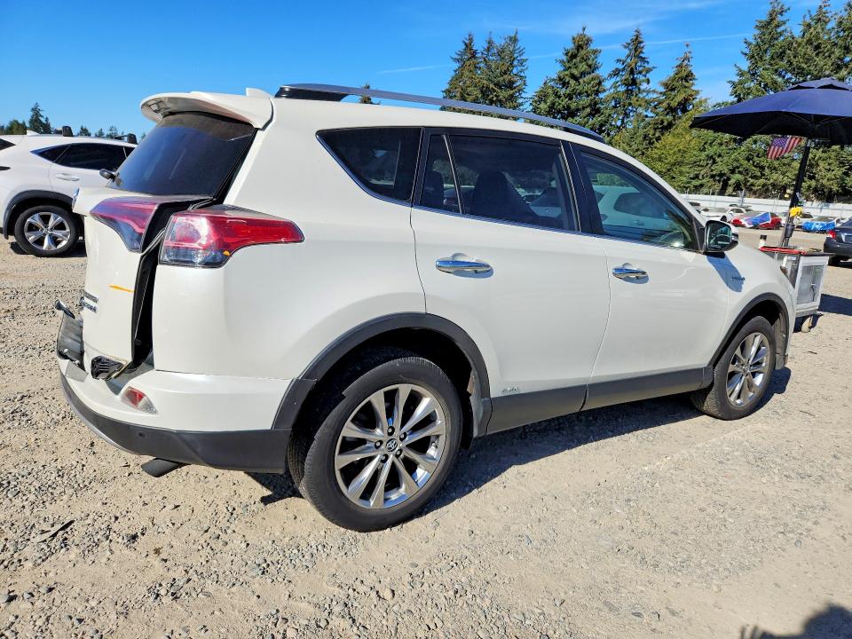 Photo 3 from auction – 2018 TOYOTA RAV4 HV with VIN JTMDJREV4JD185462