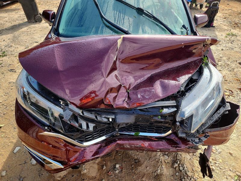 Photo 11 from auction – 2016 HONDA CR-V with VIN 5J6RM4H76GL133630