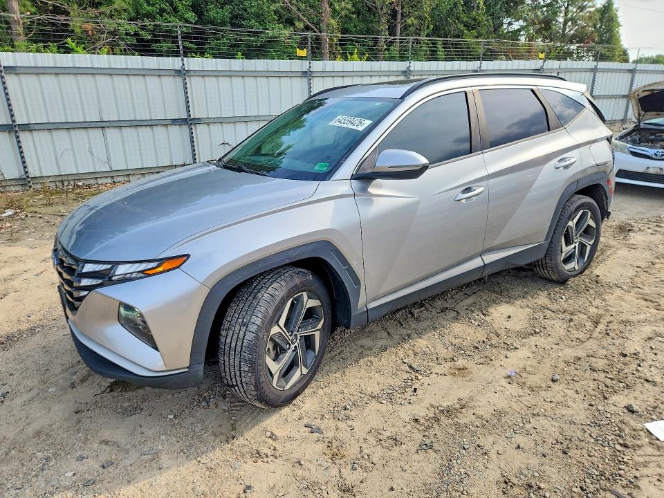 HYUNDAI TUCSON 2022 with VIN 5NMJFCAE5NH063262 - Photo from auction