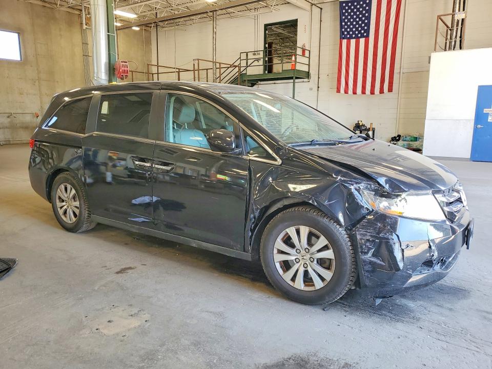 Photo 4 from auction – 2014 HONDA ODYSSEY with VIN 5FNRL5H60EB033772