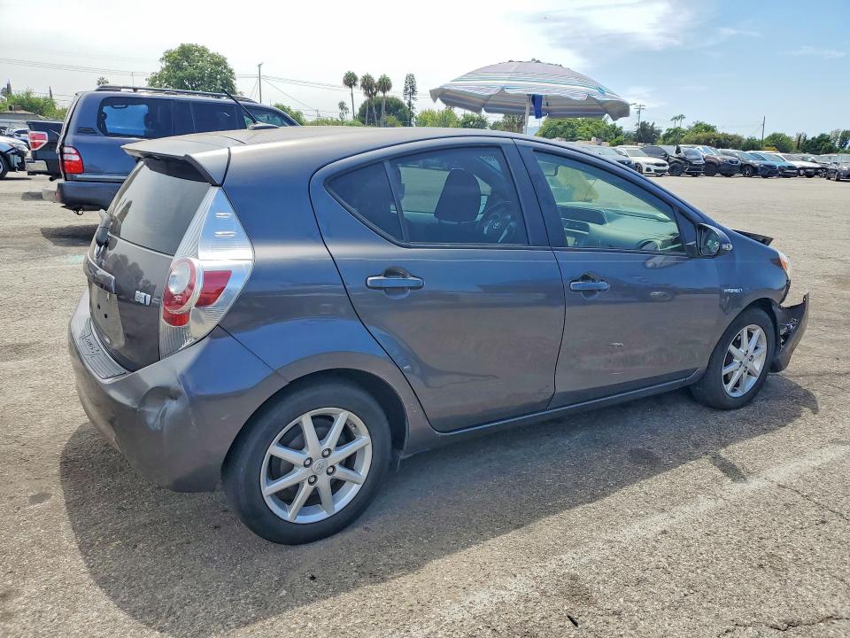 Photo 3 from auction – 2014 TOYOTA PRIUS C with VIN JTDKDTB34E1570042