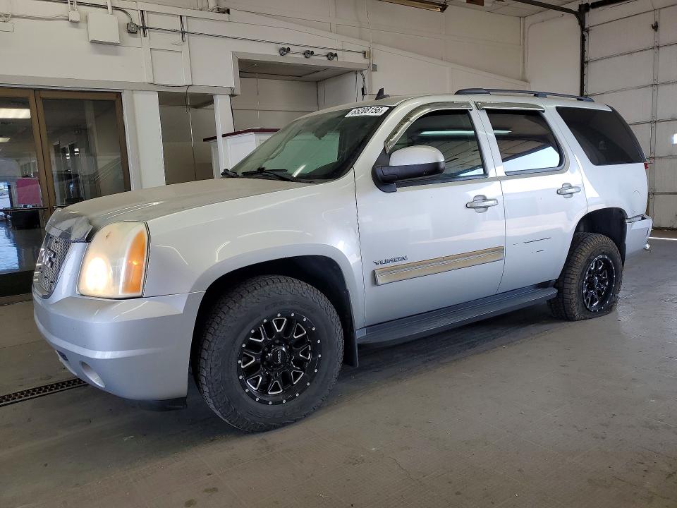 GMC YUKON 2011 with VIN 1GKS2AE08BR384999 - Photo from auction