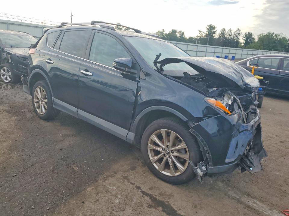 Photo 4 from auction – 2018 TOYOTA RAV4 with VIN 2T3DFREV9JW746274