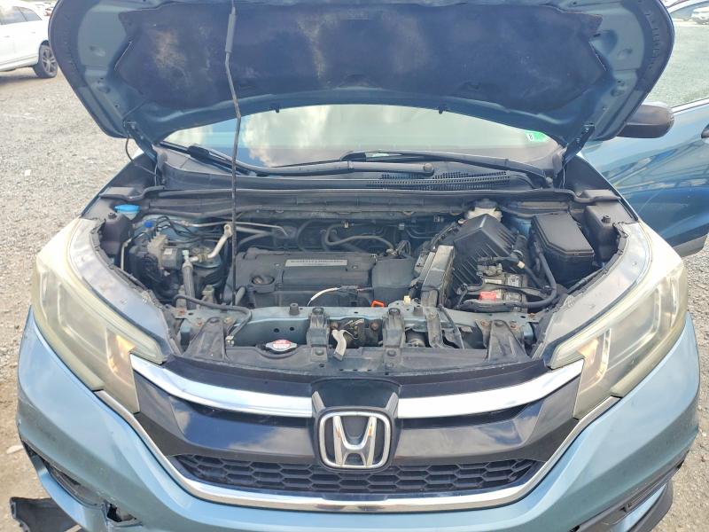Photo 12 from auction – 2015 HONDA CR-V with VIN 5J6RM4H3XFL011817