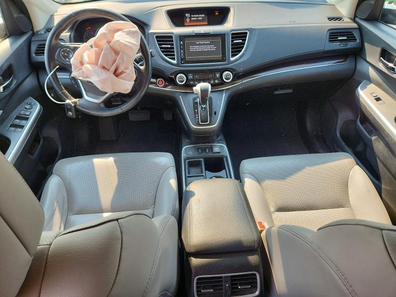 Photo 8 from auction – 2015 HONDA CR-V with VIN 2HKRM4H76FH680891