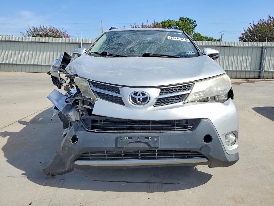 Photo 5 from auction – 2014 TOYOTA RAV4 with VIN JTMDFREV1ED084984