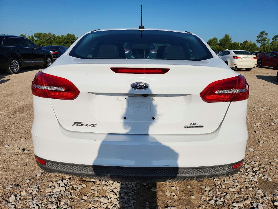Photo 6 from auction – 2016 FORD FOCUS with VIN 1FADP3F27GL391234