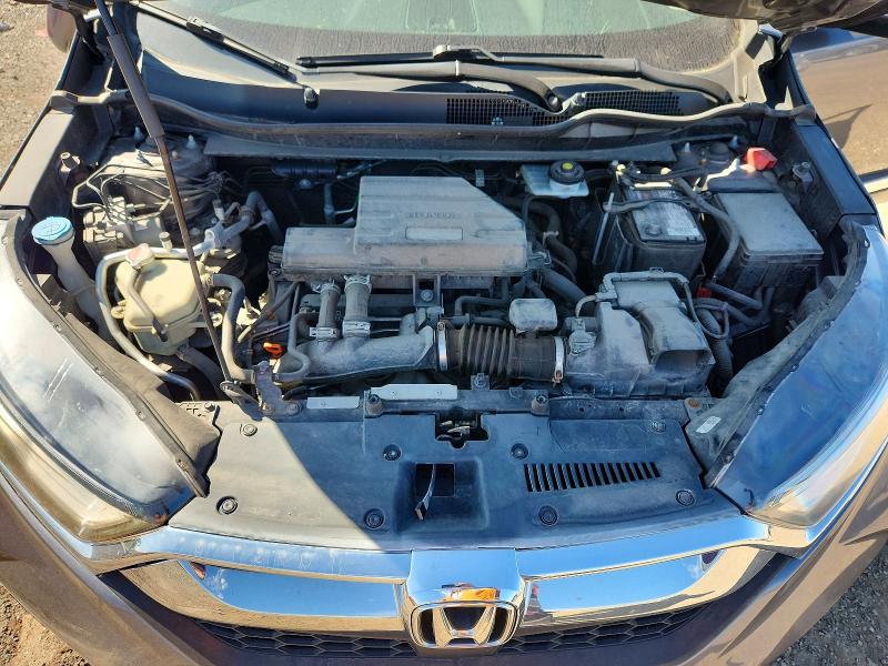 Photo 12 from auction – 2018 HONDA CR-V with VIN 7FARW2H93JE061807