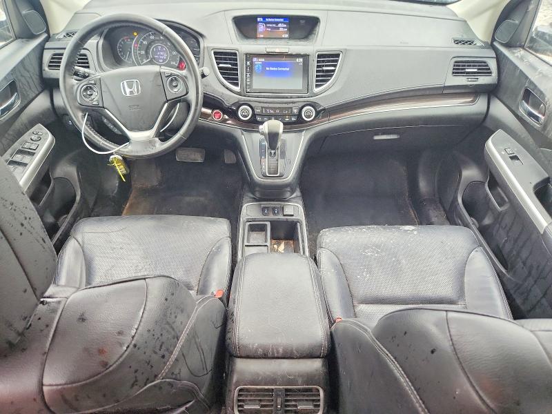 Photo 8 from auction – 2015 HONDA CR-V with VIN 2HKRM4H70FH611484