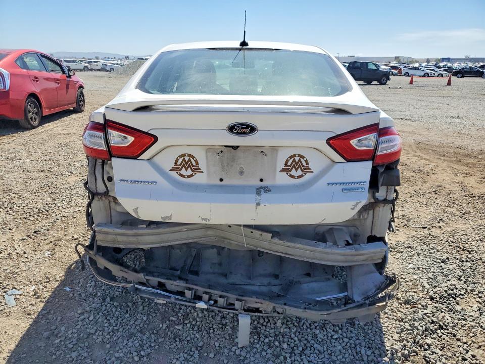 Foto 6 de la subasta – 2016 FORD FUSION con VIN 3FA6P0K97GR106849