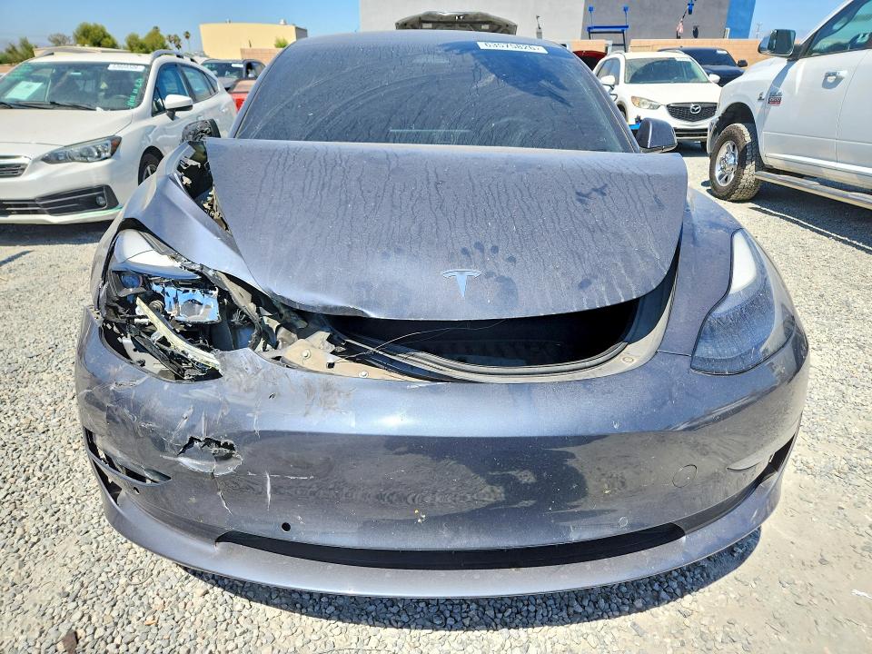 Photo 5 from auction – 2022 TESLA MODEL 3 with VIN 5YJ3E1EC2NF296378