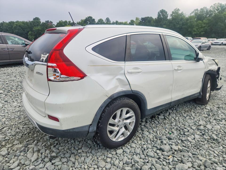 Photo 3 from auction – 2015 HONDA CR-V with VIN 5J6RM4H70FL021582