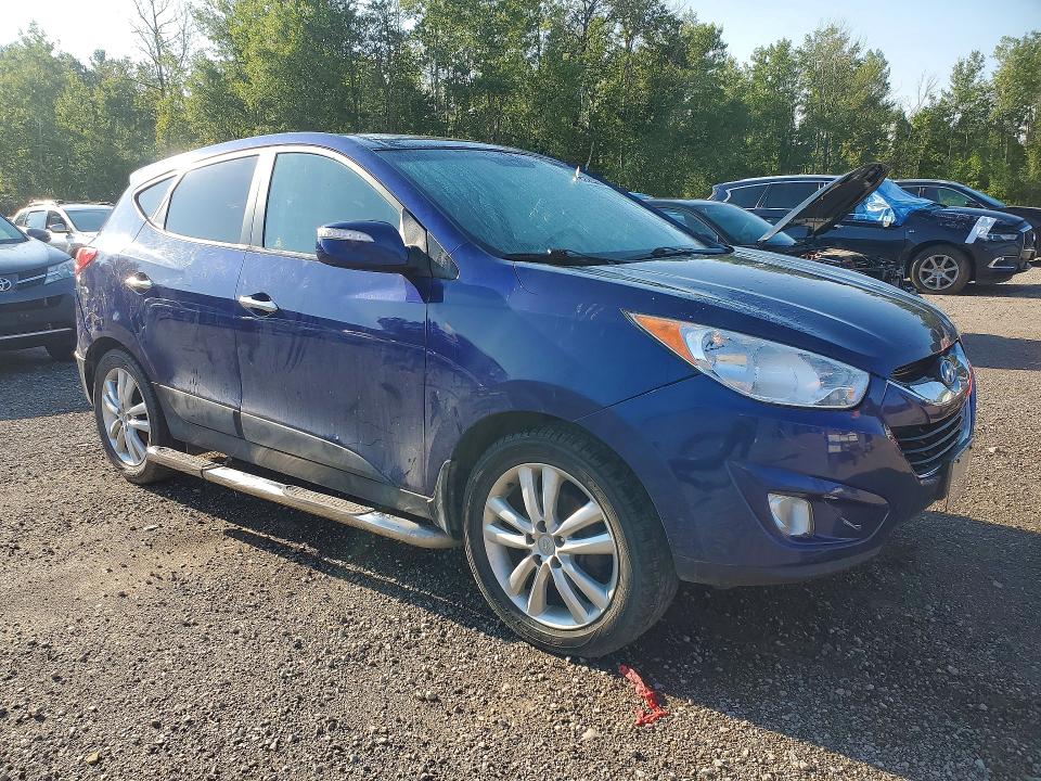 Photo 4 from auction – 2012 HYUNDAI TUCSON with VIN KM8JUCAC2CU517490