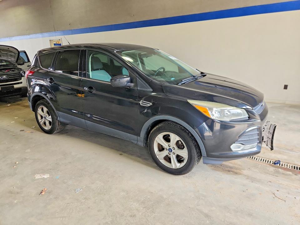 Photo 4 from auction – 2015 FORD ESCAPE with VIN 1FMCU0G7XFUC58379