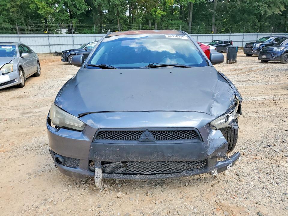 Photo 5 from auction – 2009 MITSUBISHI LANCER with VIN JA3AU86W19U001777