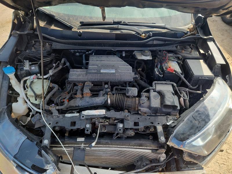 Photo 11 from auction – 2018 HONDA CR-V with VIN 7FARW2H58JE020019