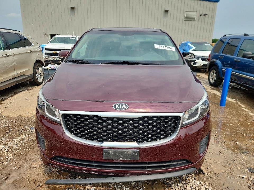Photo 5 from auction – 2015 KIA SEDONA with VIN KNDMB5C11F6059559