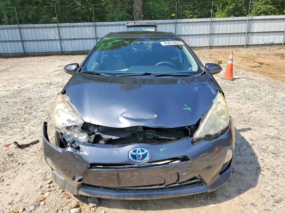 Photo 5 from auction – 2012 TOYOTA PRIUS C with VIN JTDKDTB37C1021836