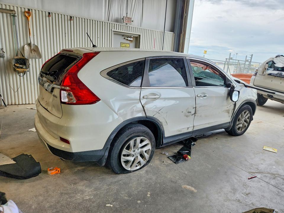 Photo 3 from auction – 2016 HONDA CR-V with VIN 5J6RM4H55GL027507