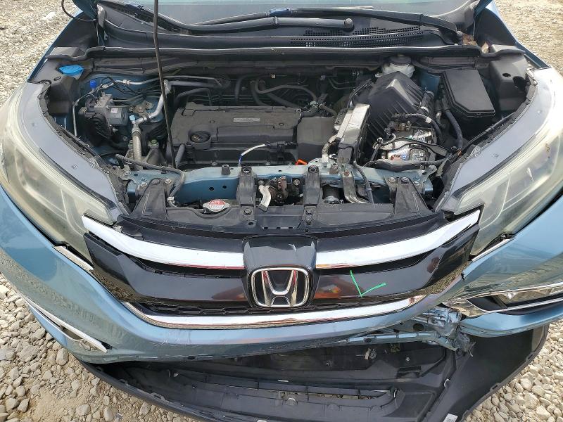 Photo 12 from auction – 2016 HONDA CR-V with VIN 2HKRM3H77GH557919