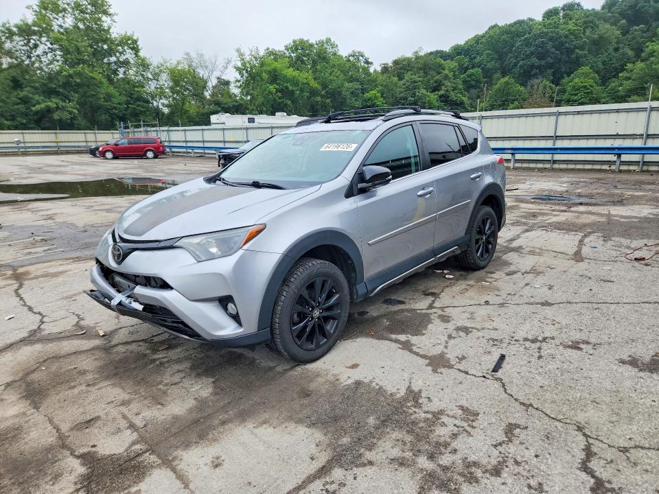 TOYOTA RAV4 2018 with VIN 2T3RFREV9JW763212 - Photo from auction