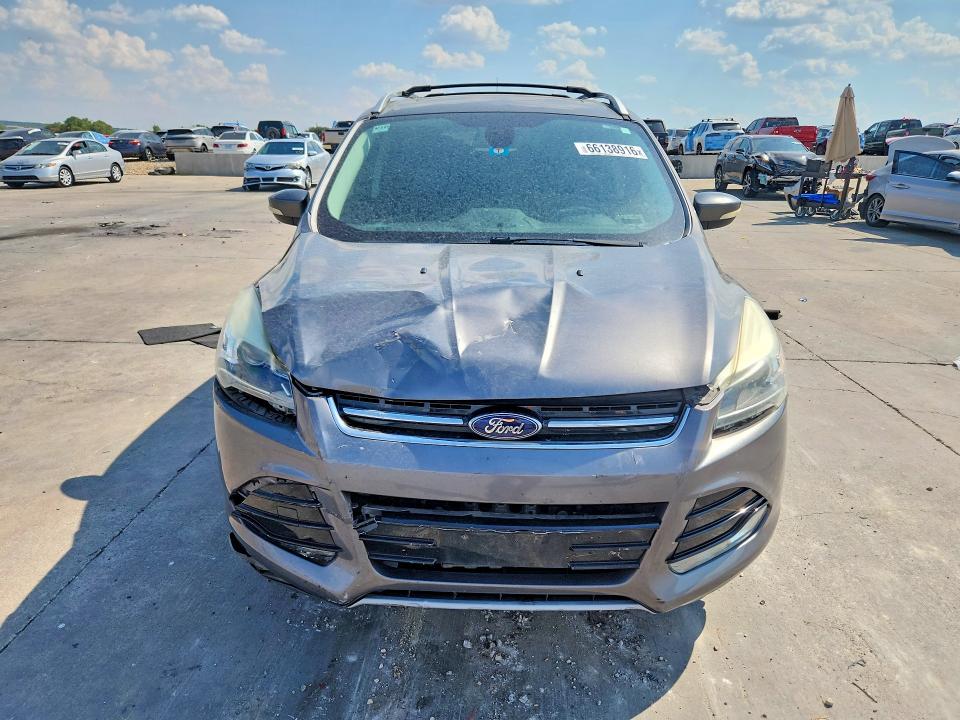 Photo 5 from auction – 2013 FORD ESCAPE with VIN 1FMCU0J98DUB07919