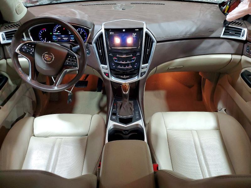 Photo 8 from auction – 2014 CADILLAC SRX with VIN 3GYFNDE39ES520472