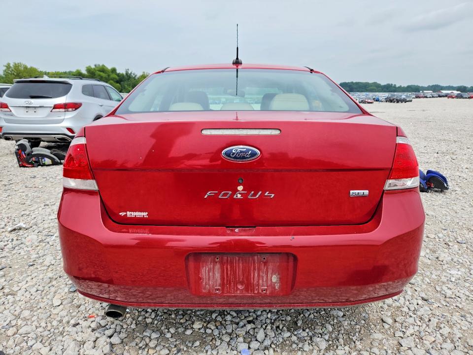 Photo 6 from auction – 2009 FORD FOCUS with VIN 1FAHP37N29W234755